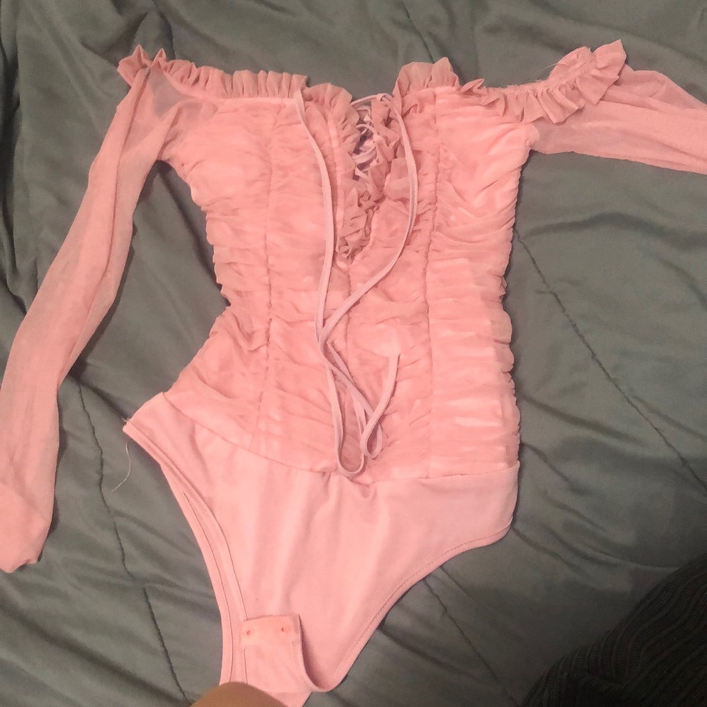Pink body suit off the shoulder
